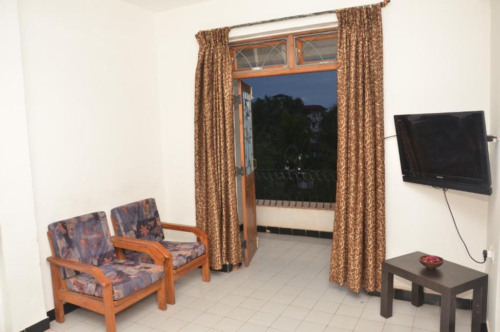 ホテル Sunkissed Plaza カラングート 部屋 写真